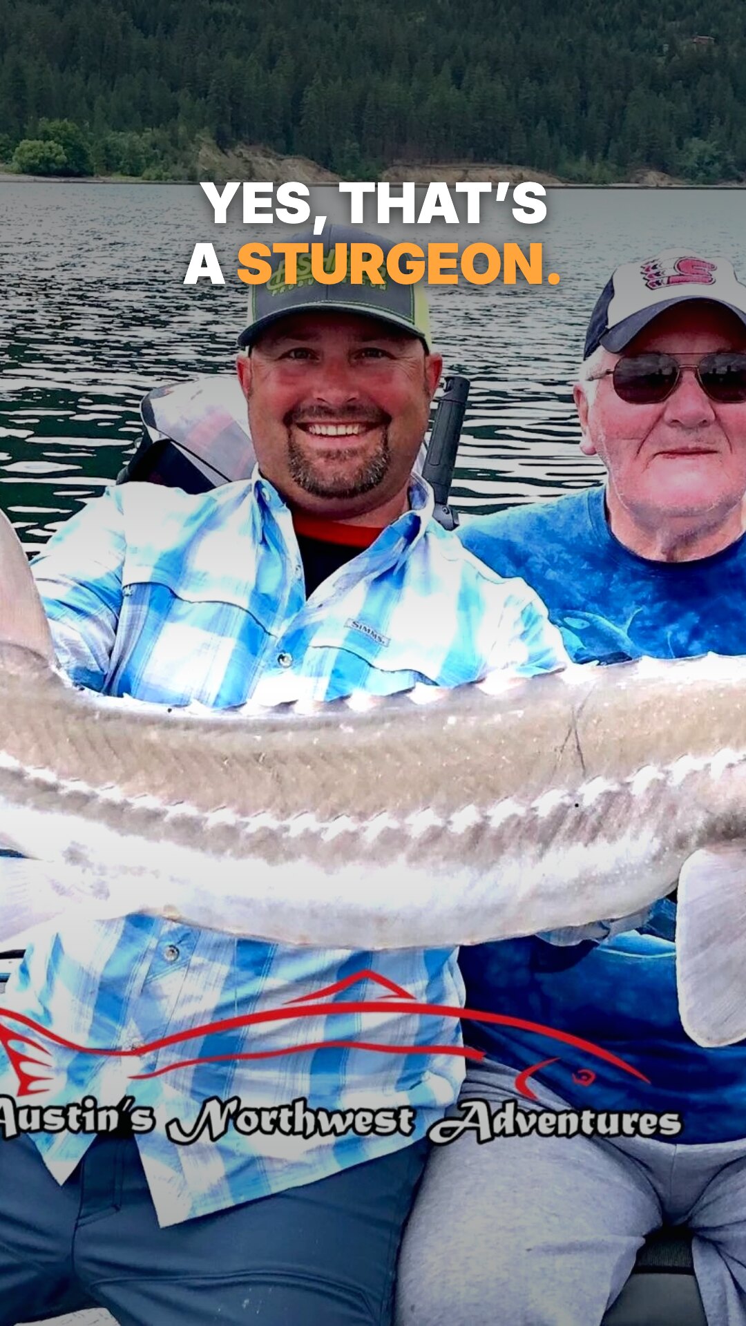 Ad: two anglers holding a giant white sturgeon, hook yes that's a sturgeon (vertical version)