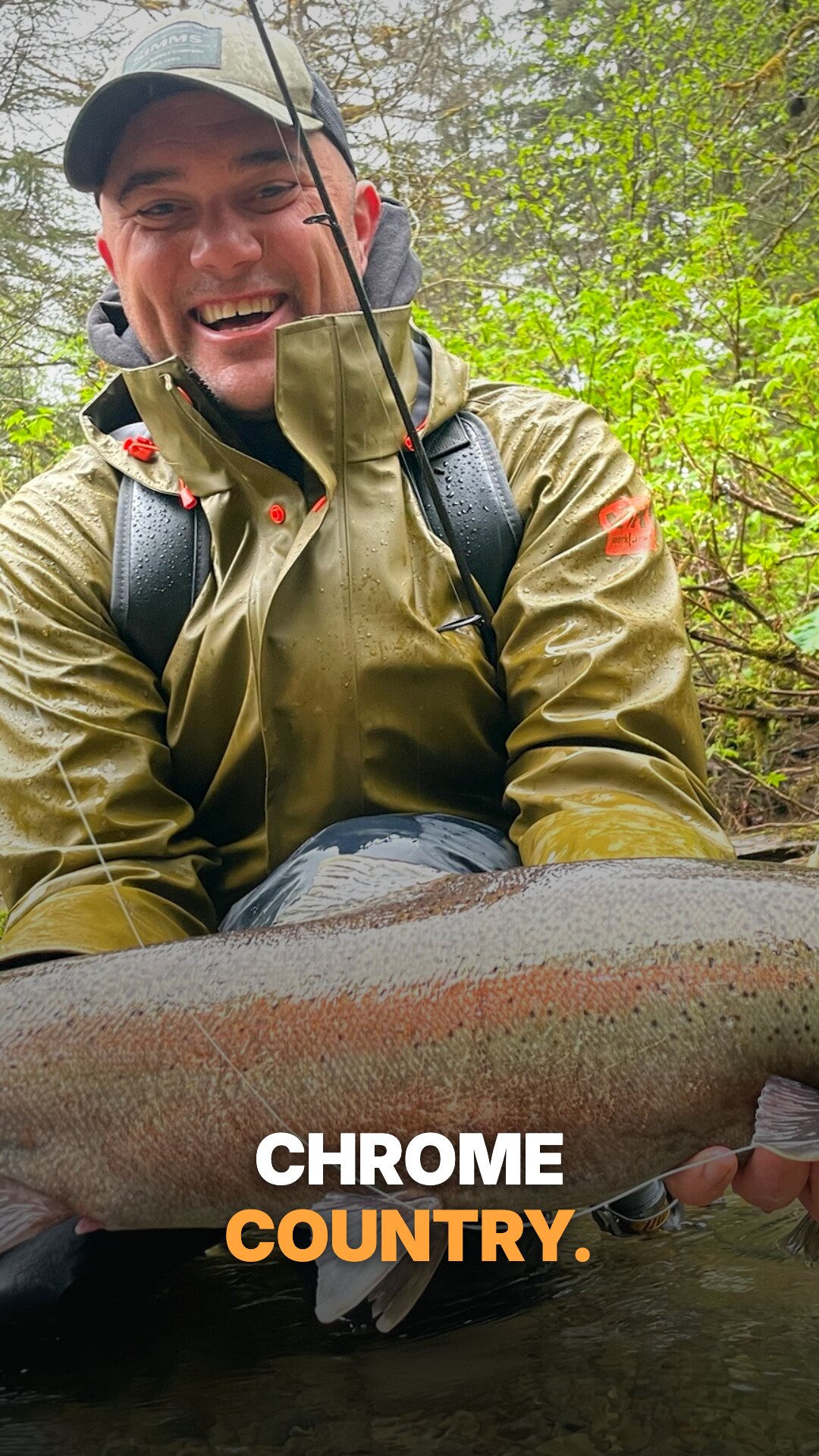Ad: type interlock CHROME behind a soaked guide holding a steelhead (vertical version)