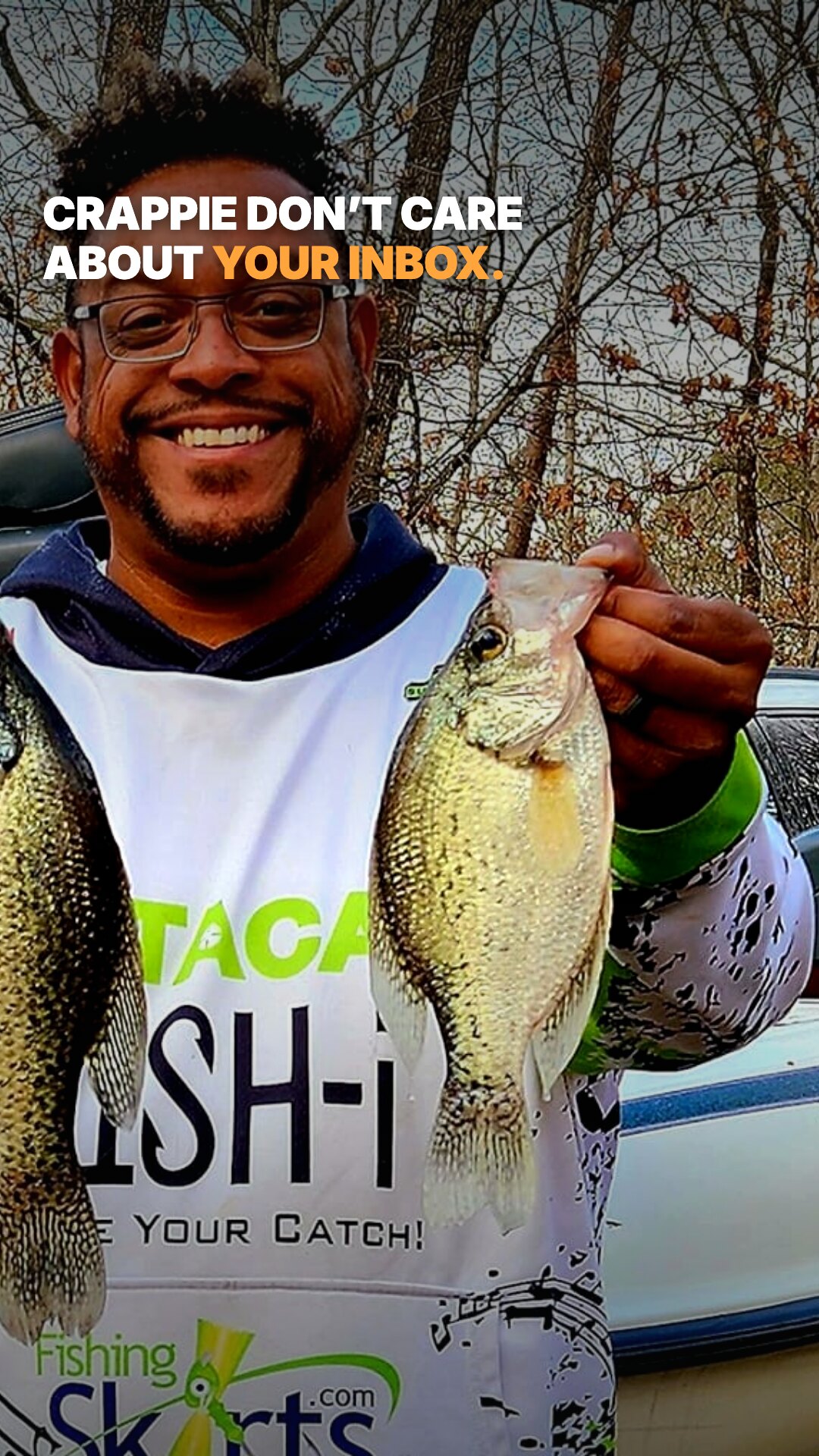 Ad: smiling angler with two crappie, hook bass don't care about your inbox (vertical version)
