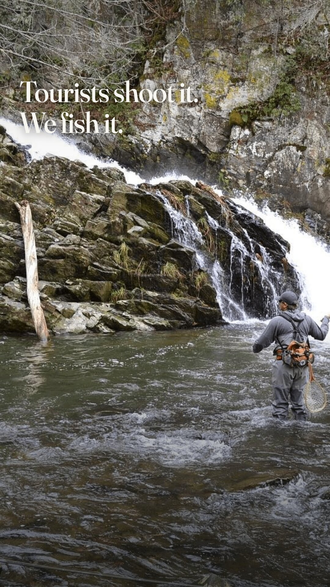 Ad: angler fishing below a waterfall, hook tourists shoot it we fish it (vertical version)
