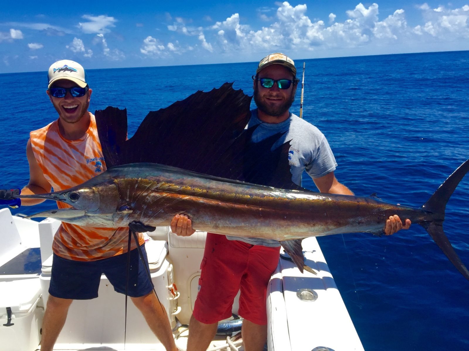 A guide working with a client on the water, photographed by B & B Sportfishing in TX