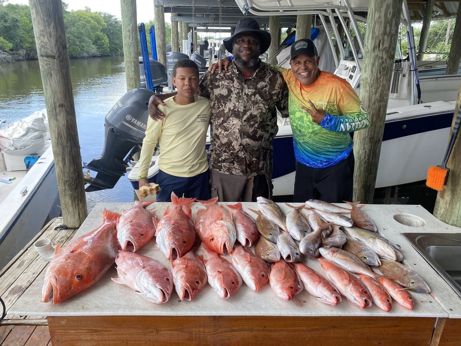 A guide working with a client on the water, photographed by Big Outdoor Charters in LA