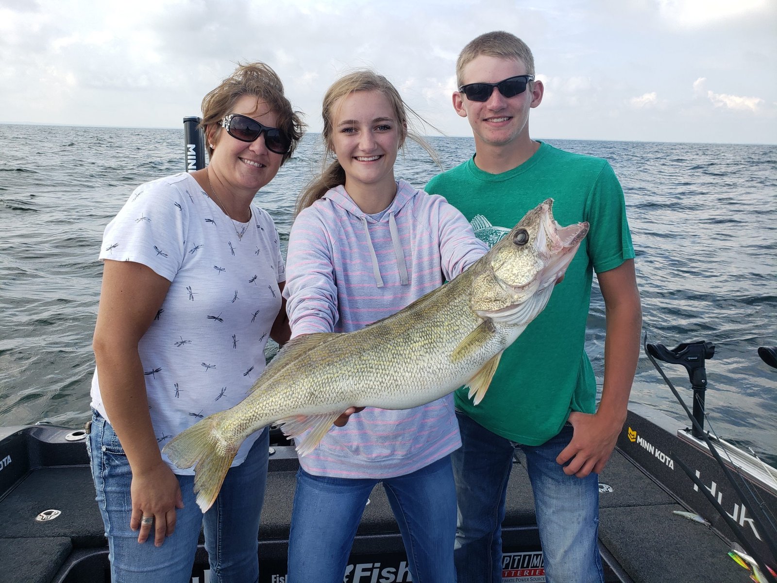 A guide working with a client on the water, photographed by Bigwater Fishing in OH