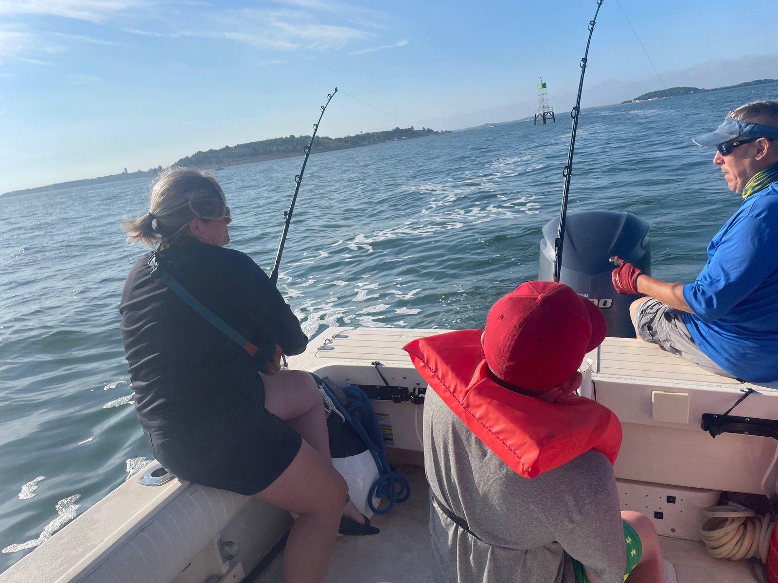 A working outfitter partway through a day, photographed by Blue Line Fishing Charters in MA