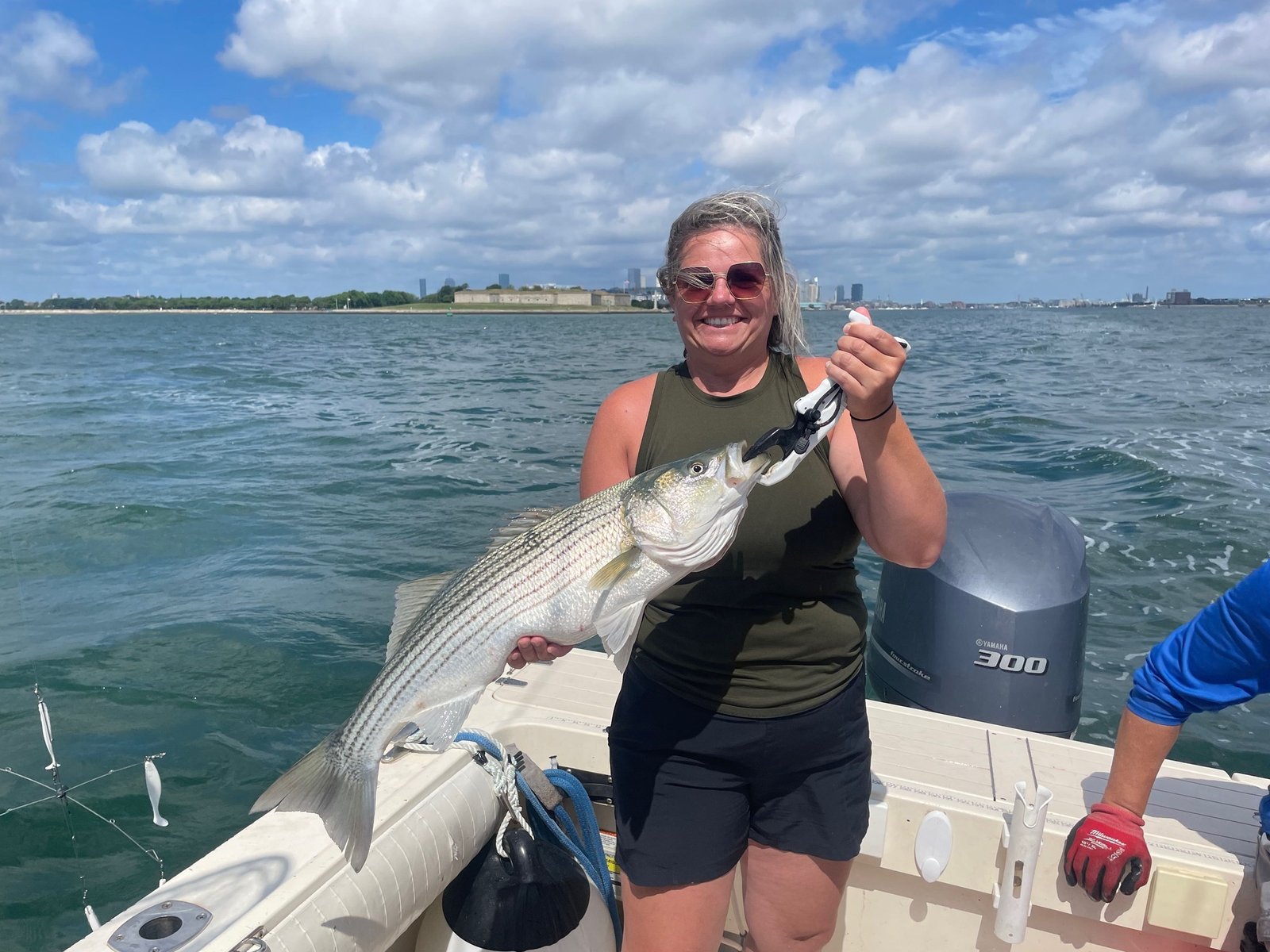 The job of guiding, mid-trip, photographed by Blue Line Fishing Charters in MA