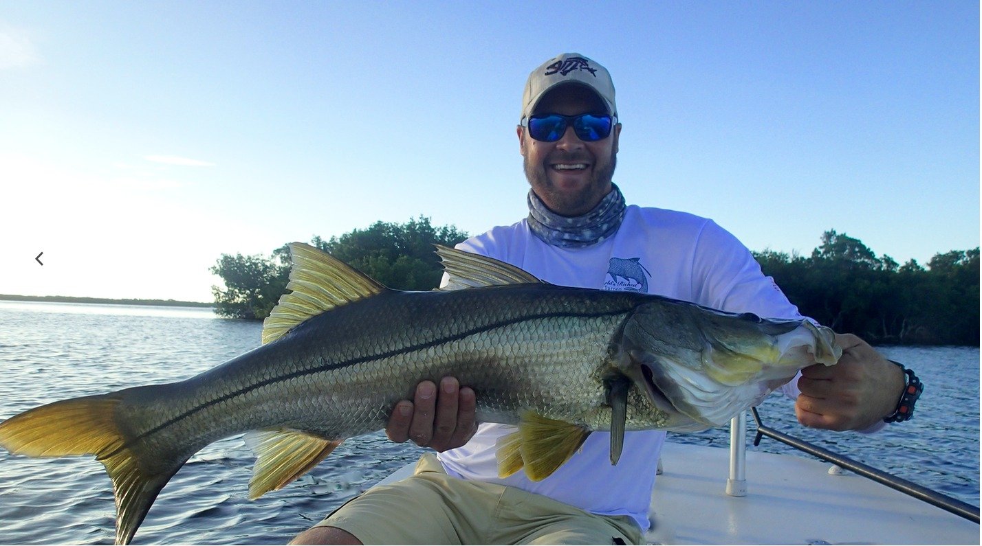 A working guide boat on open water, photographed by Boca Grande Fly Fishing Guide Services in FL