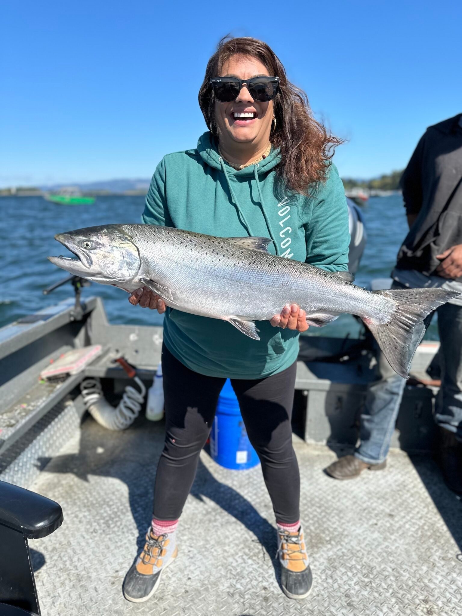 A guide working with a client on the water, photographed by Bonk 'em All Adventures in WA