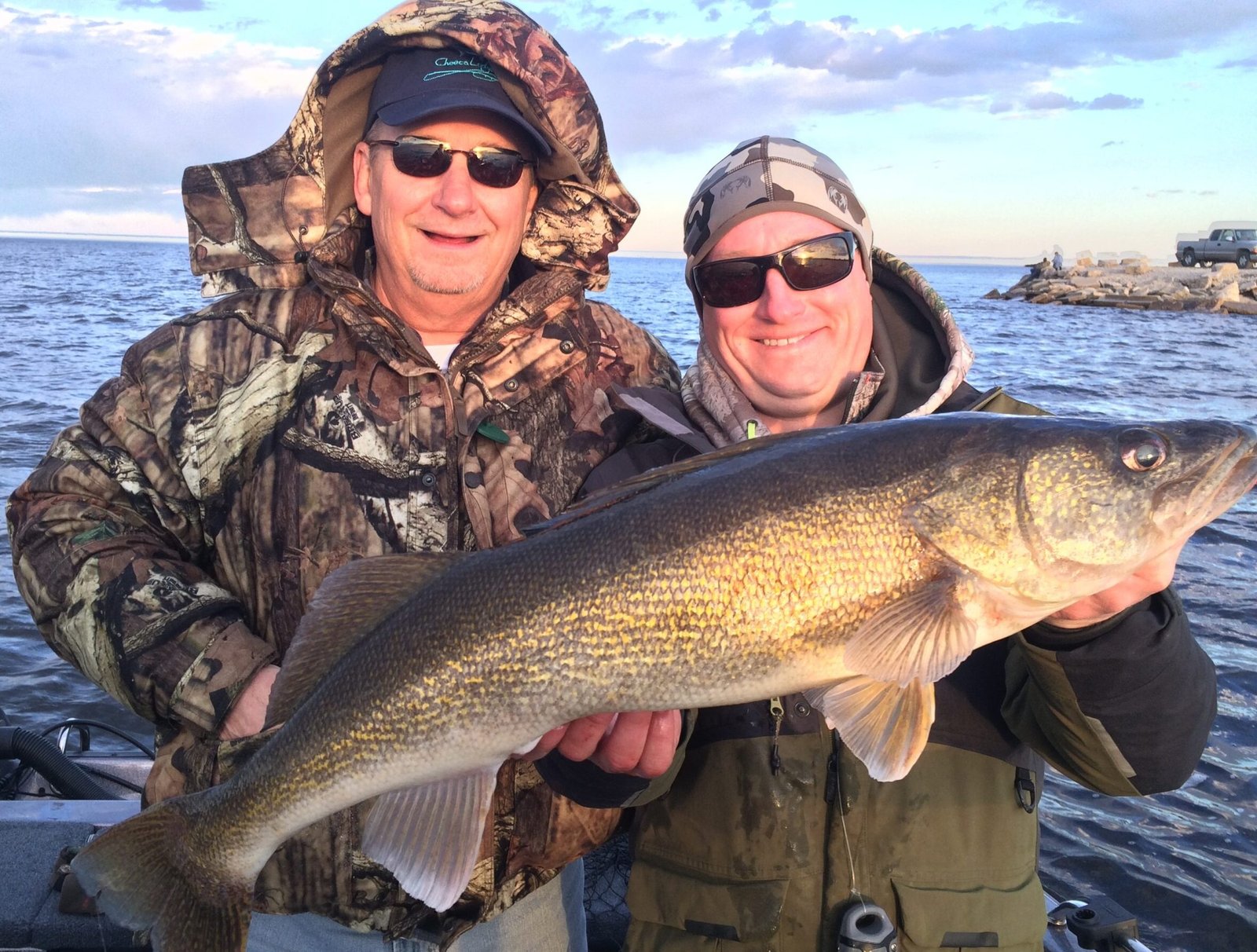 A guide working with a client on the water, photographed by Brett Jolly Charters in WI