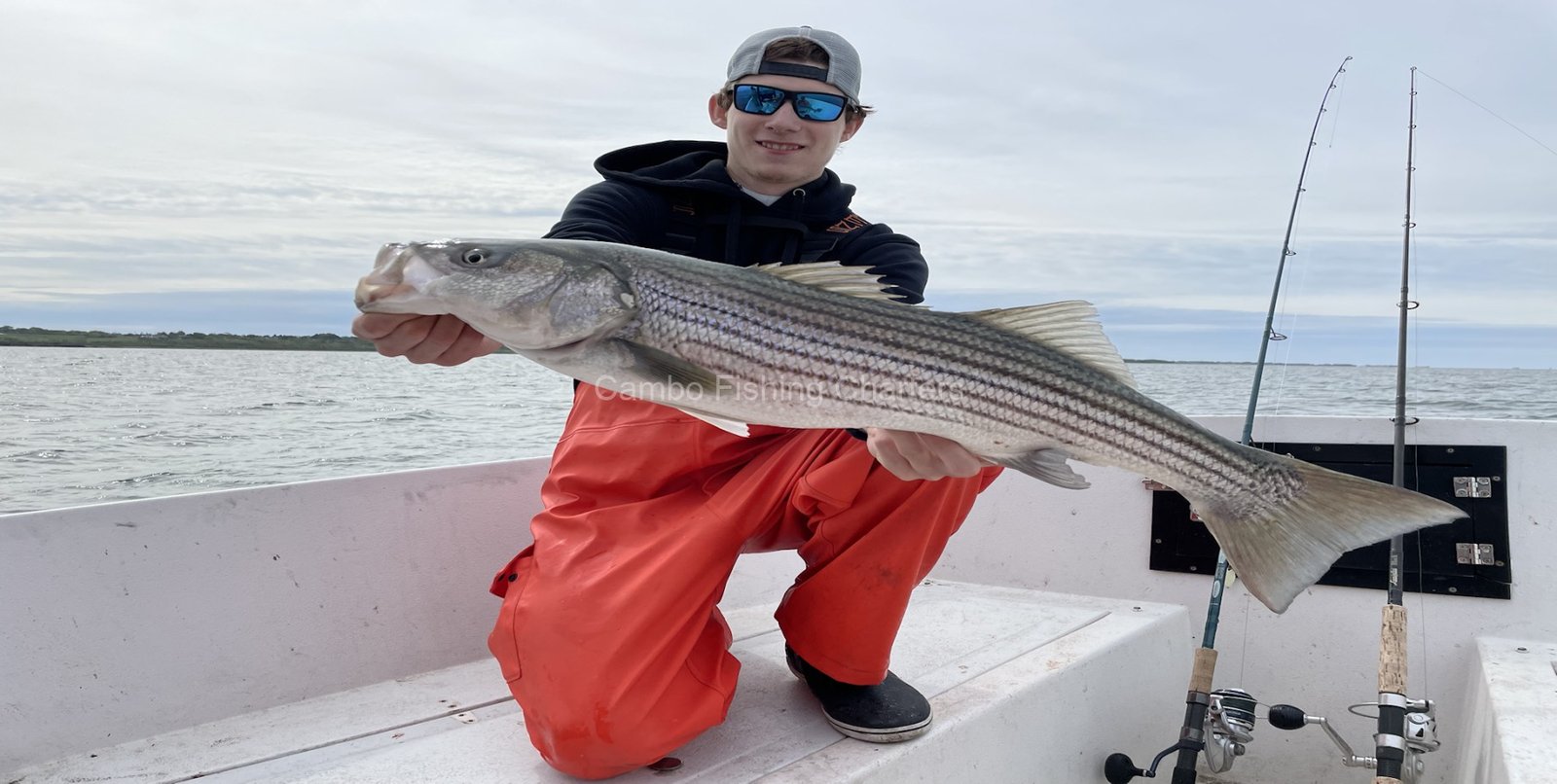 A guide at work during a trip, photographed by Cambo Fishing Charters in MA