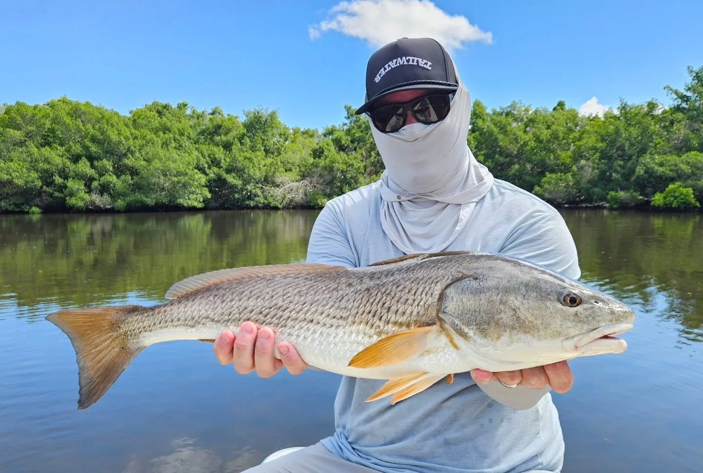 A guide and client fishing together, photographed by Captain Austin McWhorter Fly Fishing Guide in FL