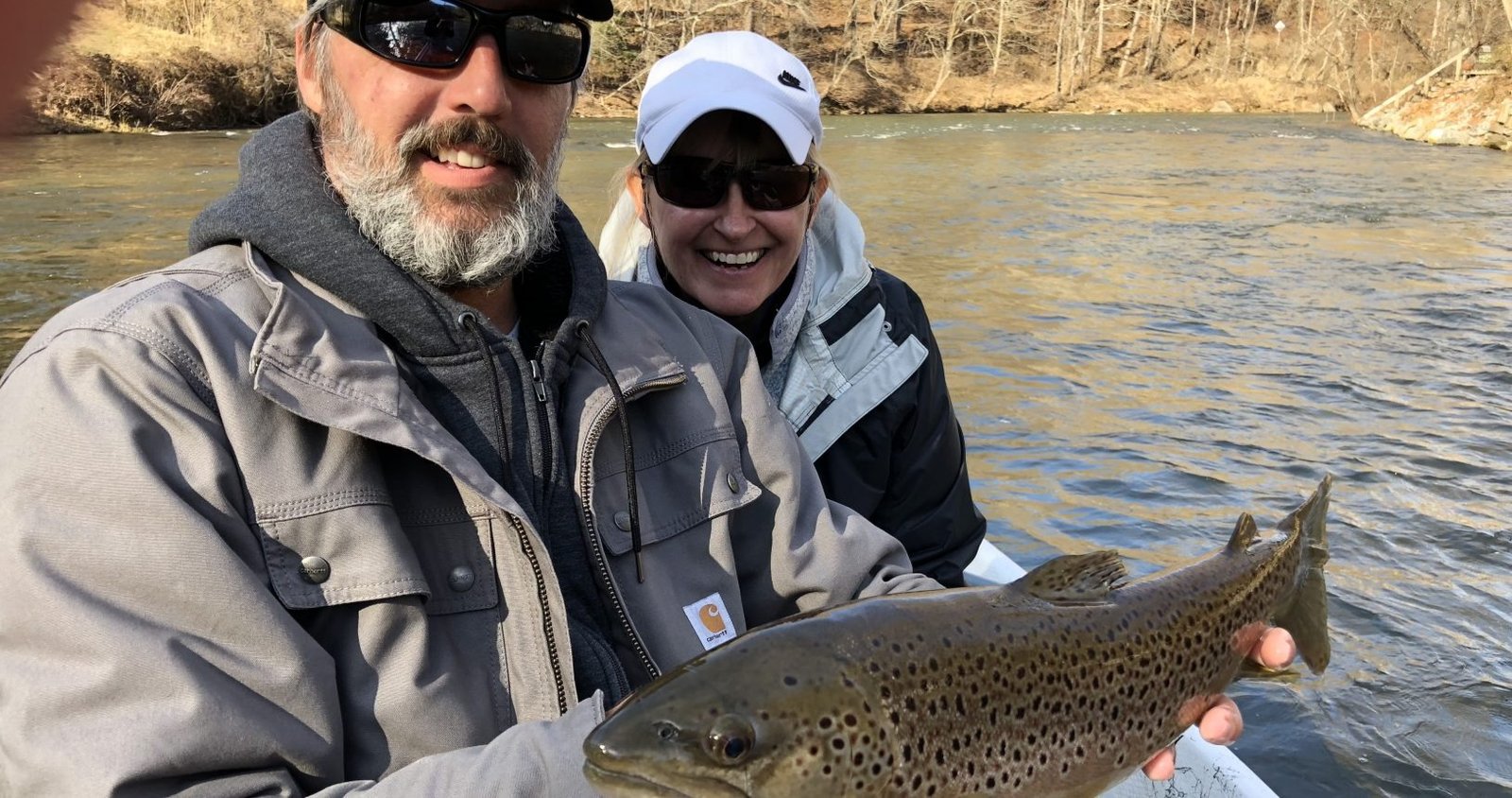 A guide working with a client on the water, photographed by Castaway Anglers in NC