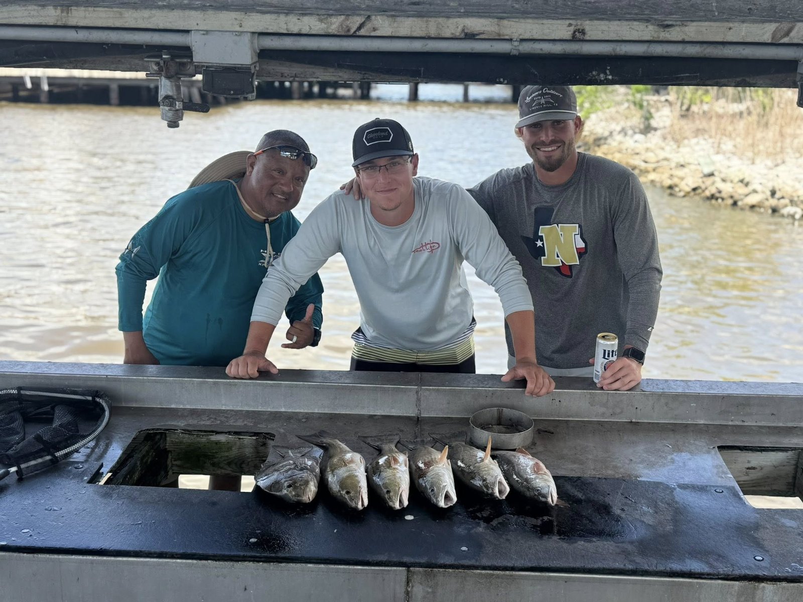 A guide at work during a trip, photographed by Cat 5 Fishing Charters in LA