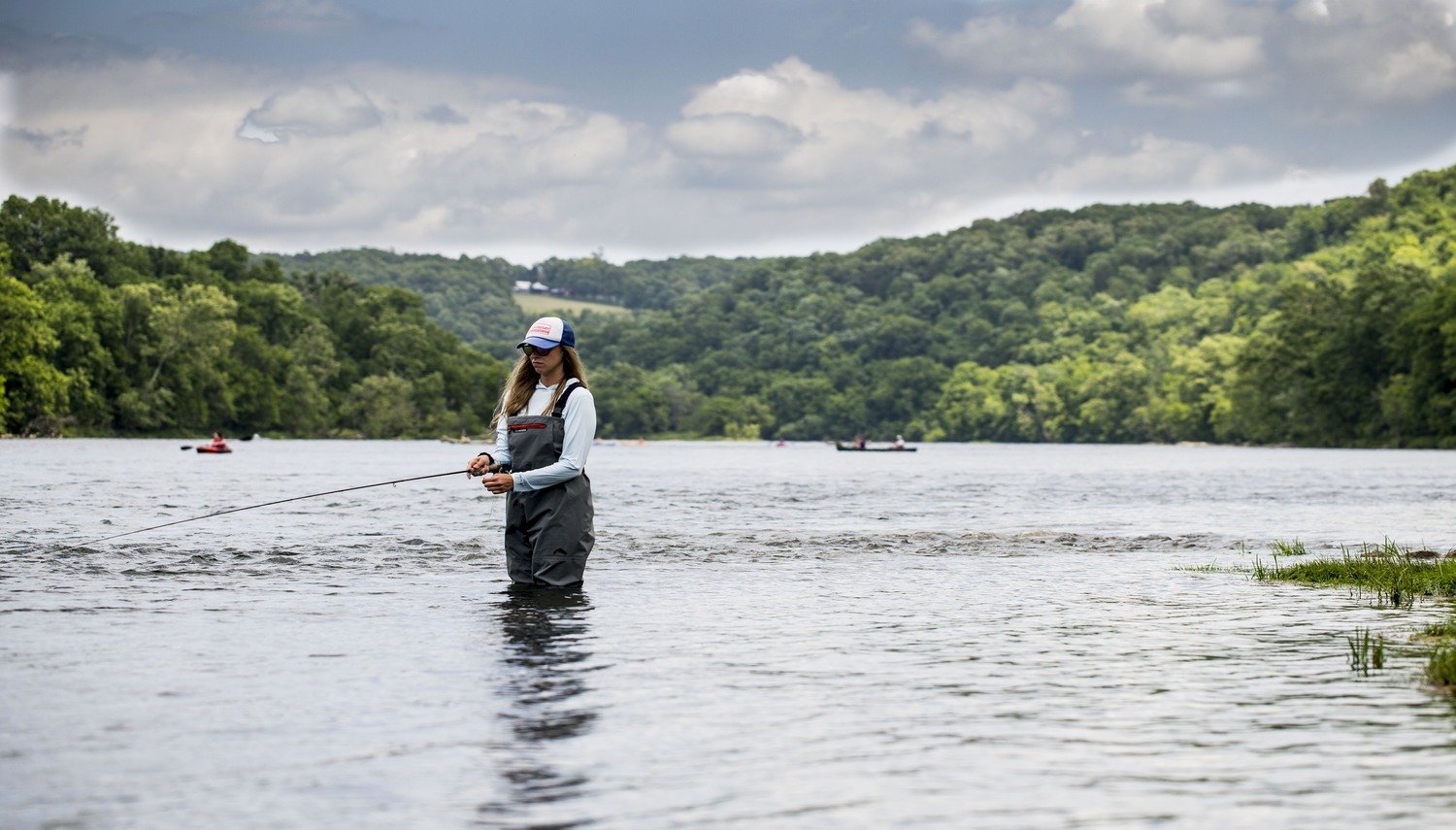 A client fishing on a guided trip, photographed by Dally's Ozark Fly Fisher in AR