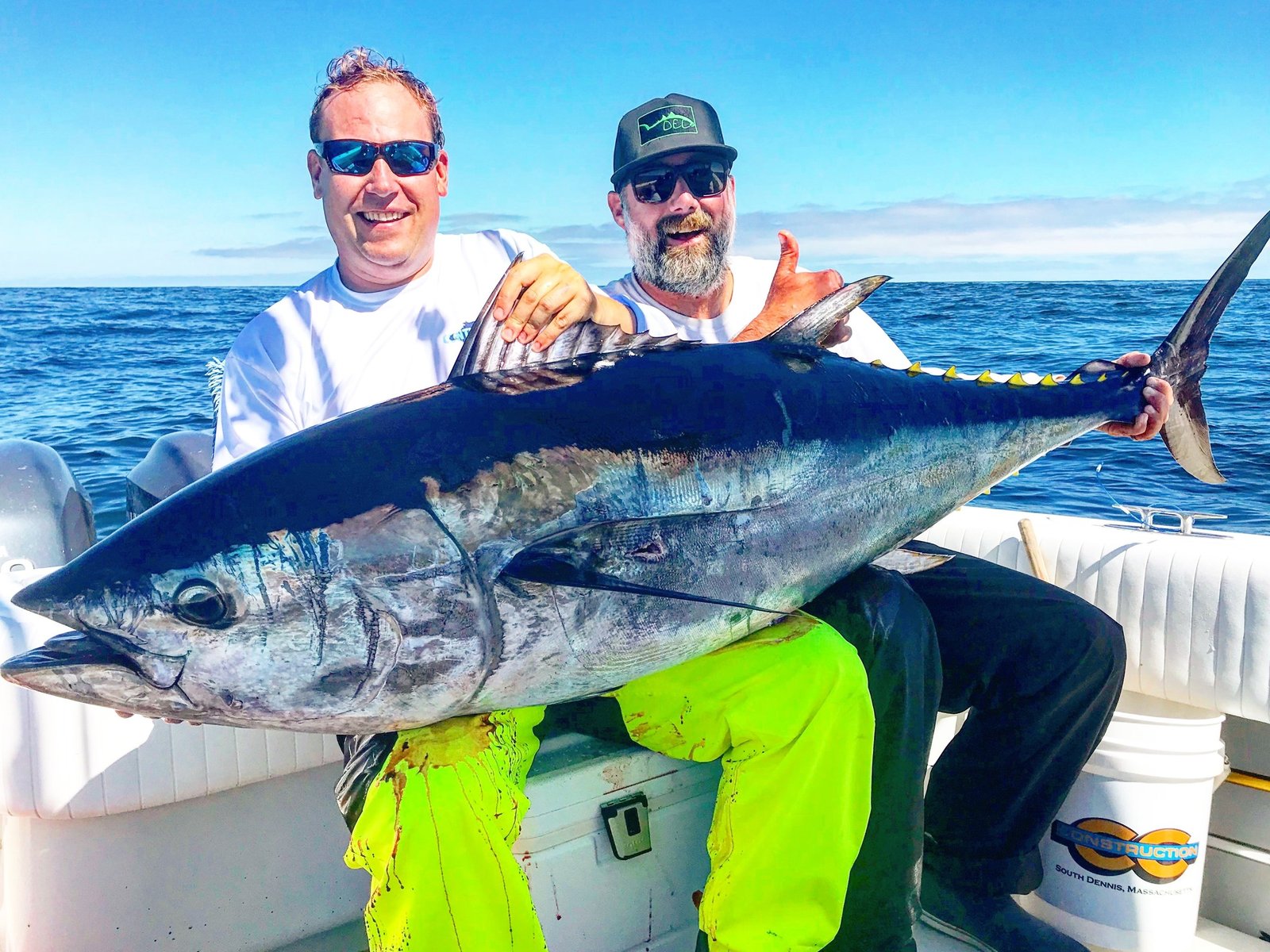 A guide working with a client on the water, photographed by Down East Charters in MA