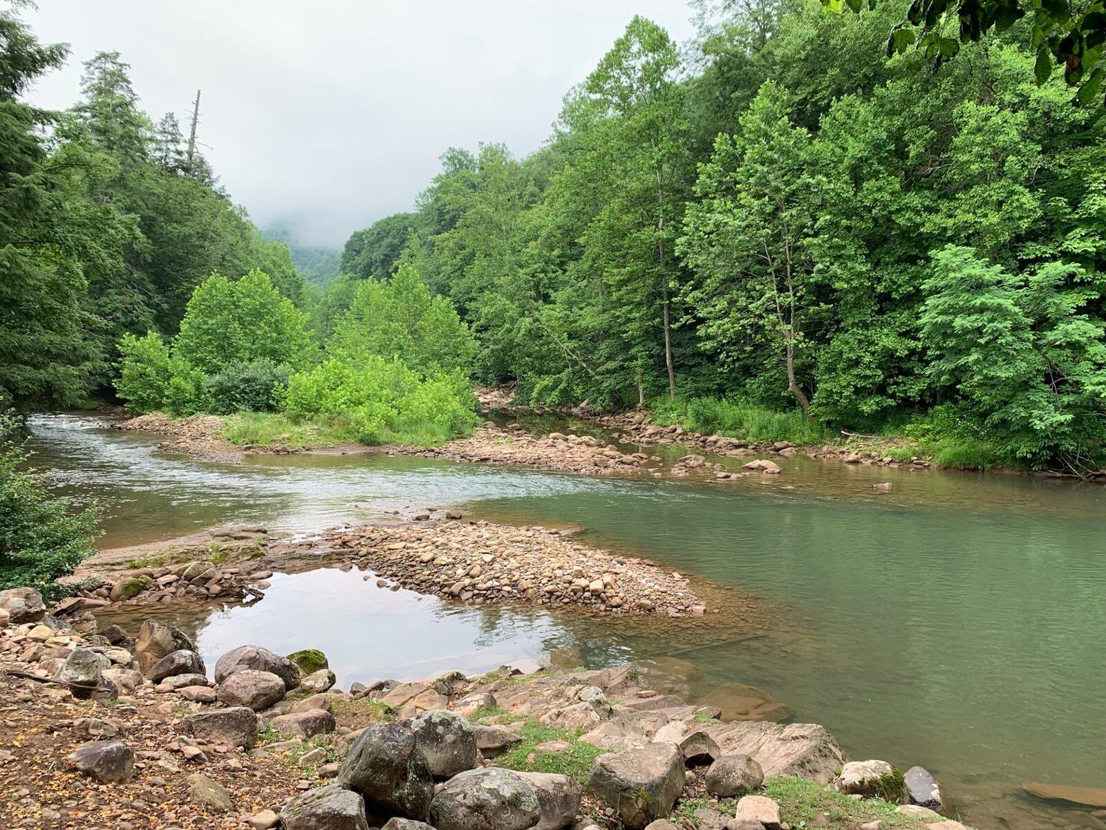A guide working with a client on the water, photographed by Elk Springs Resort in WV