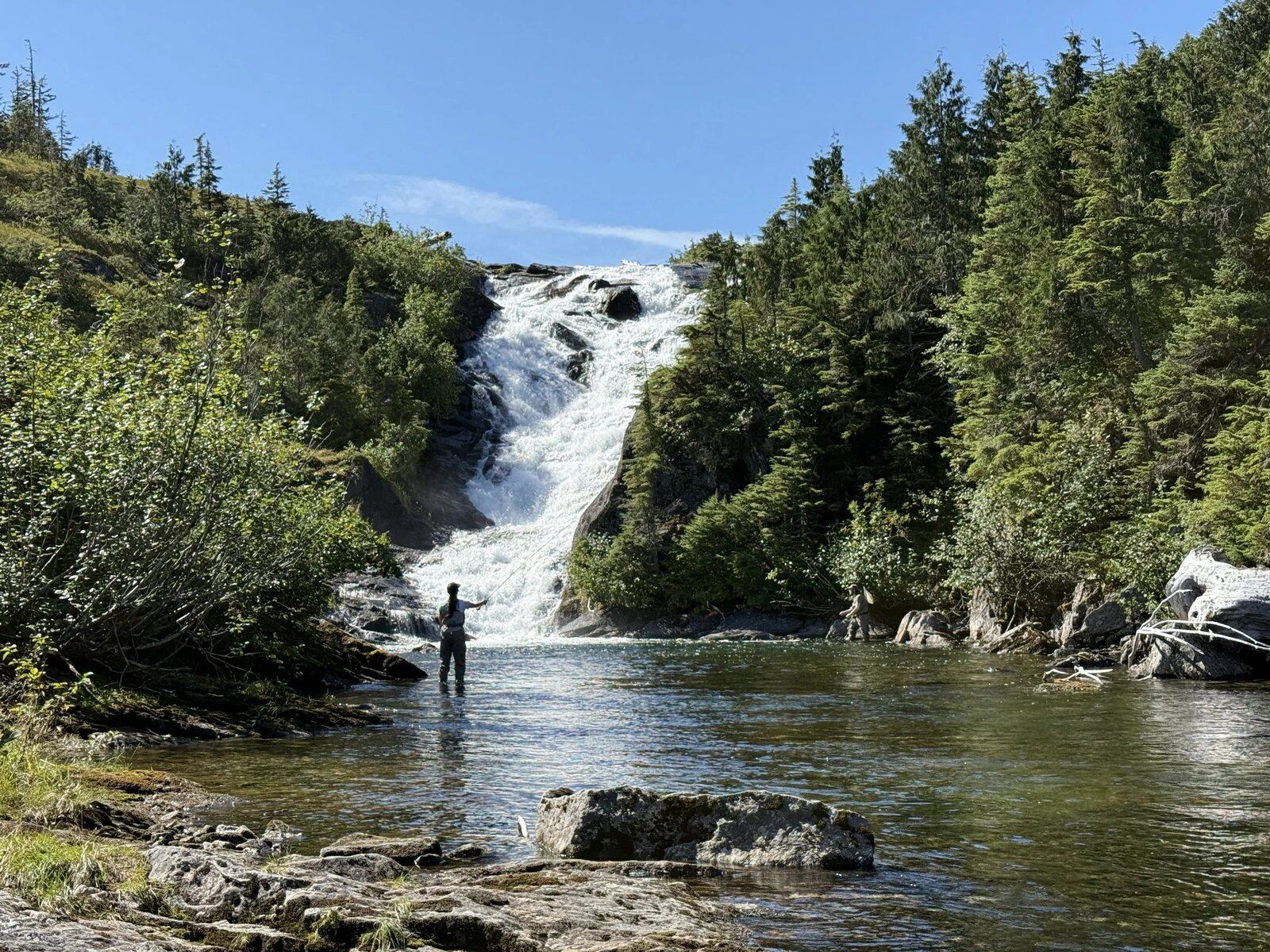 A guide at work during a trip, photographed by Family Air Tours & Hook Up Fly Shop in AK