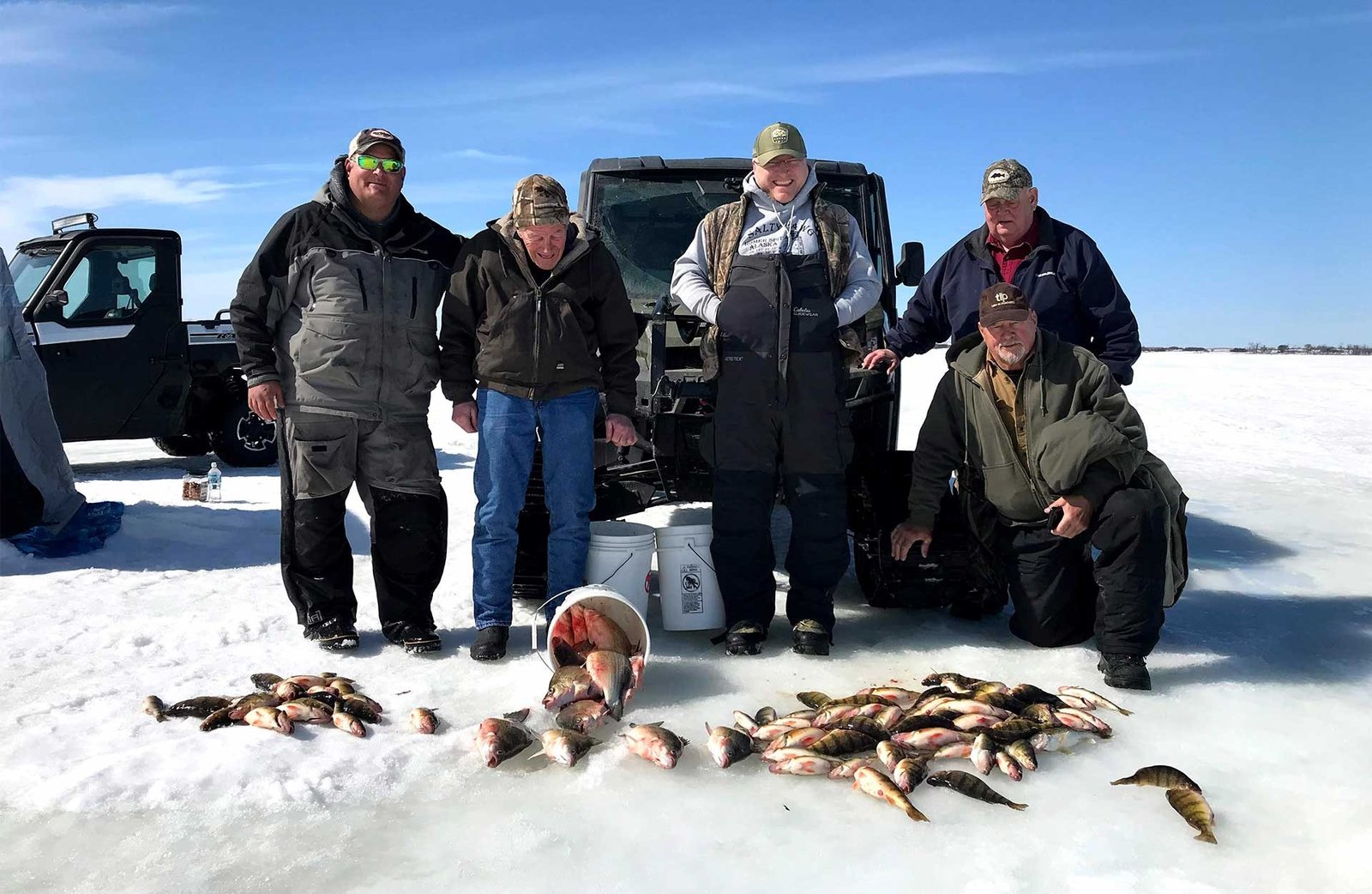 A guide working with a client on the water, photographed by Fin-Hunters Guide Service in ND