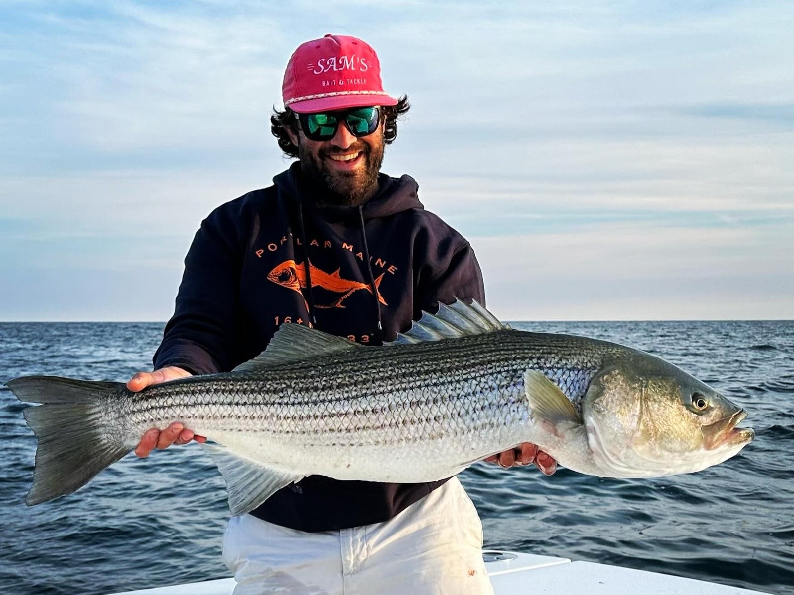 A guide at work during a trip, photographed by Fish Freshly Salted Guide Service in RI
