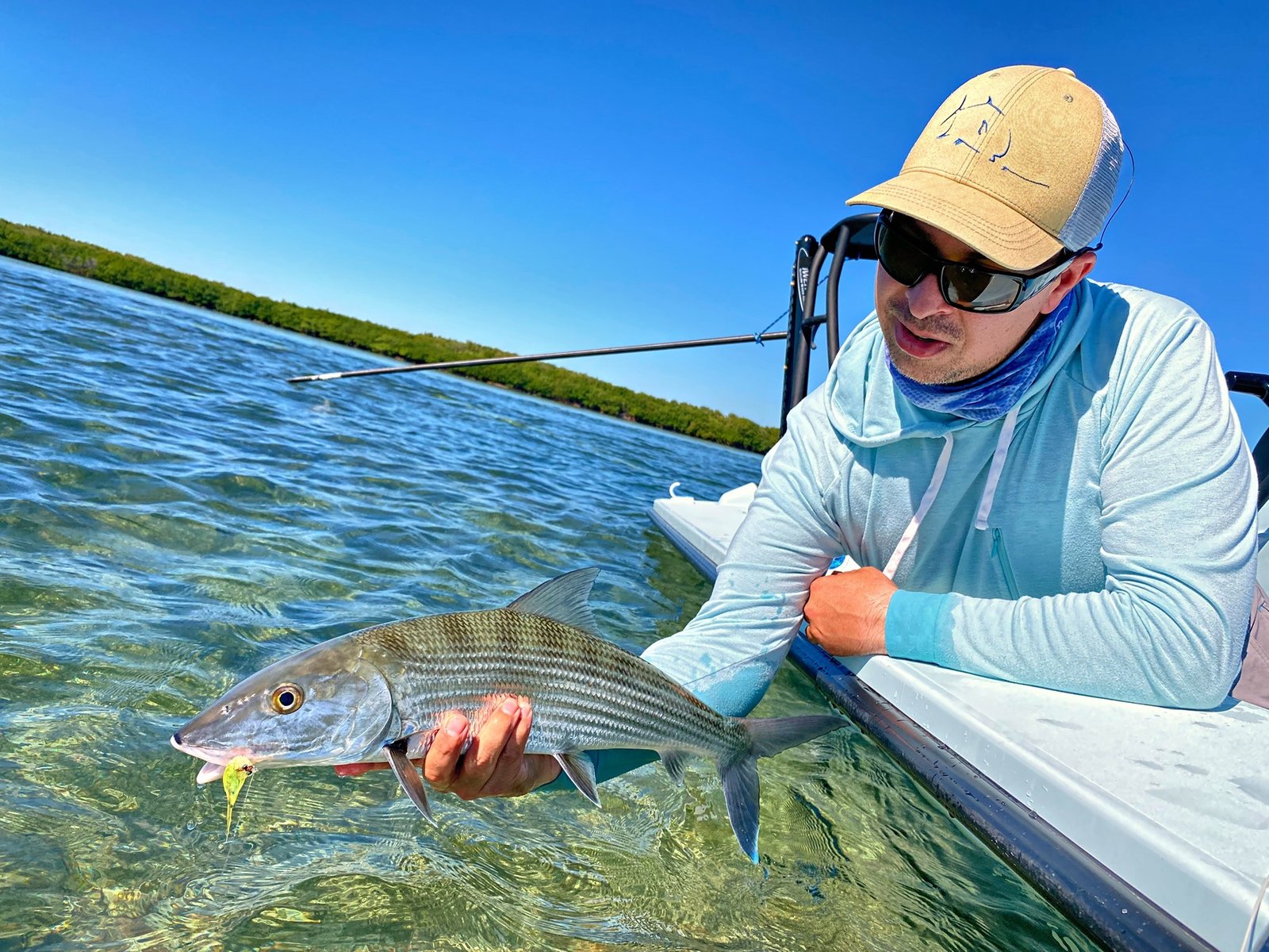 A guide and client fishing together, photographed by Fly Fish Miami in FL