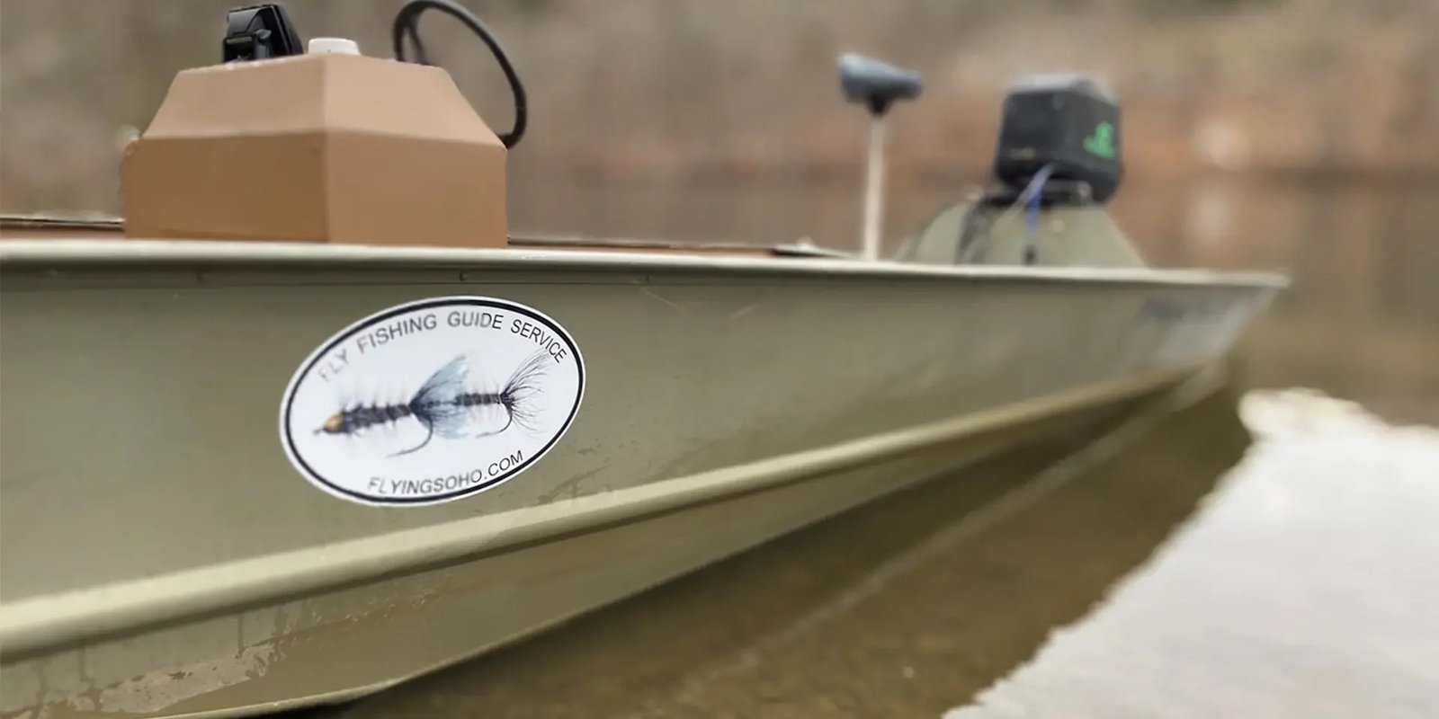 A guide working with a client on the water, photographed by Flying Soho in TN