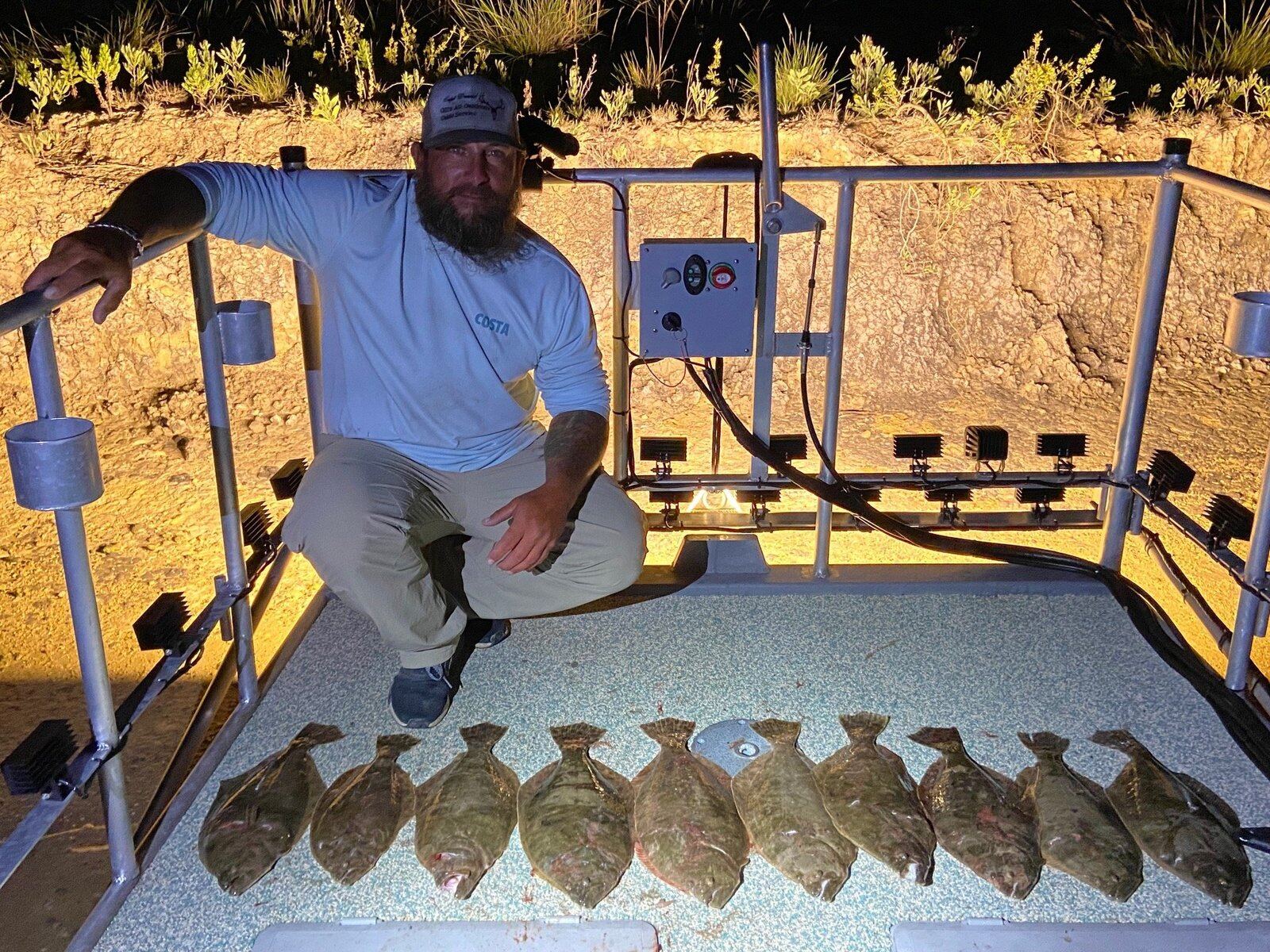 A guide working with a client on the water, photographed by Galveston Bay Guide Service in TX