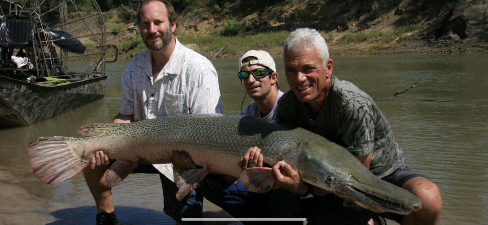 A guide working with a client on the water, photographed by Garzilla Guide Service in TX