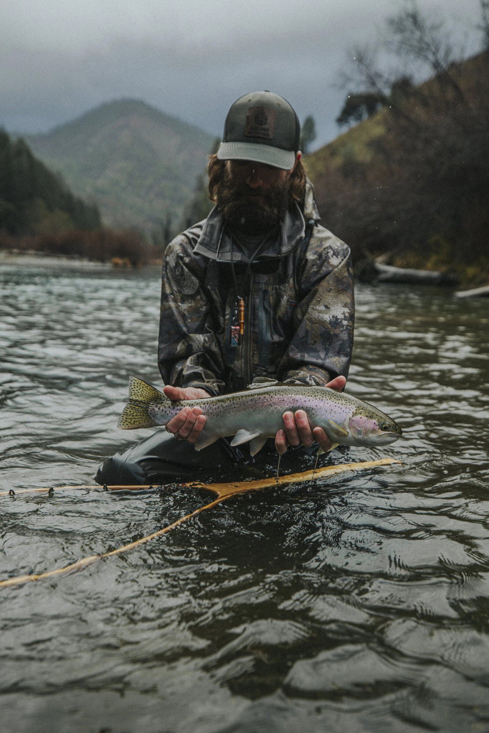 A guide at work during a trip, photographed by Grunt Fly Fishing in CA
