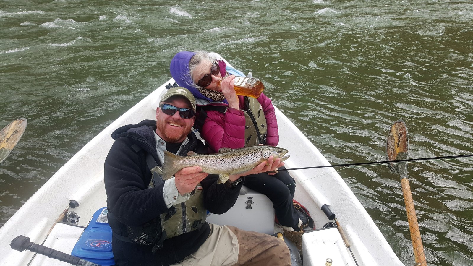 A guide at work during a trip, photographed by Harcourt Fly Fishing 3G in CO