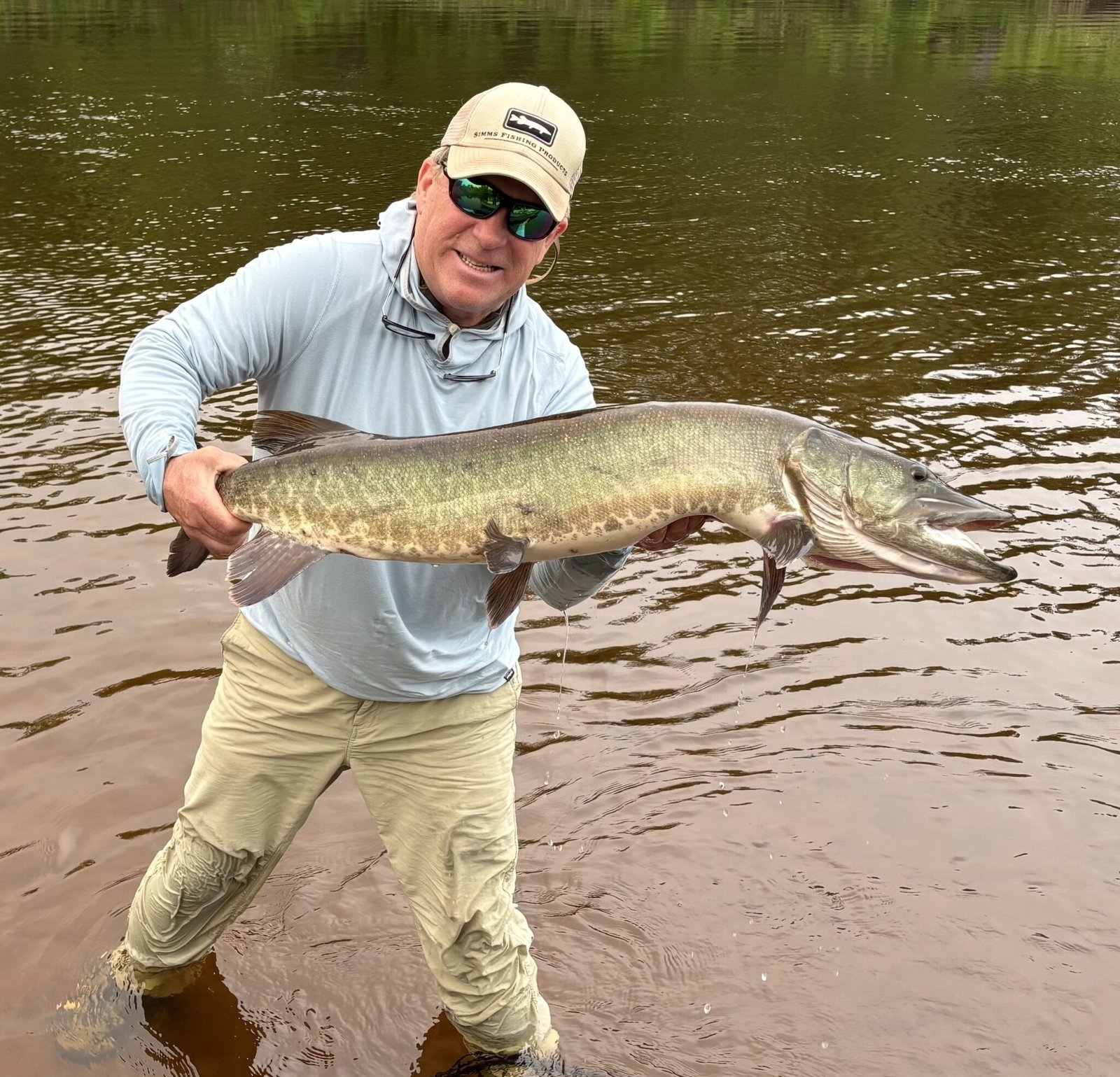 A guide at work during a trip, photographed by Headwaters Fly Fishing Co. in MN