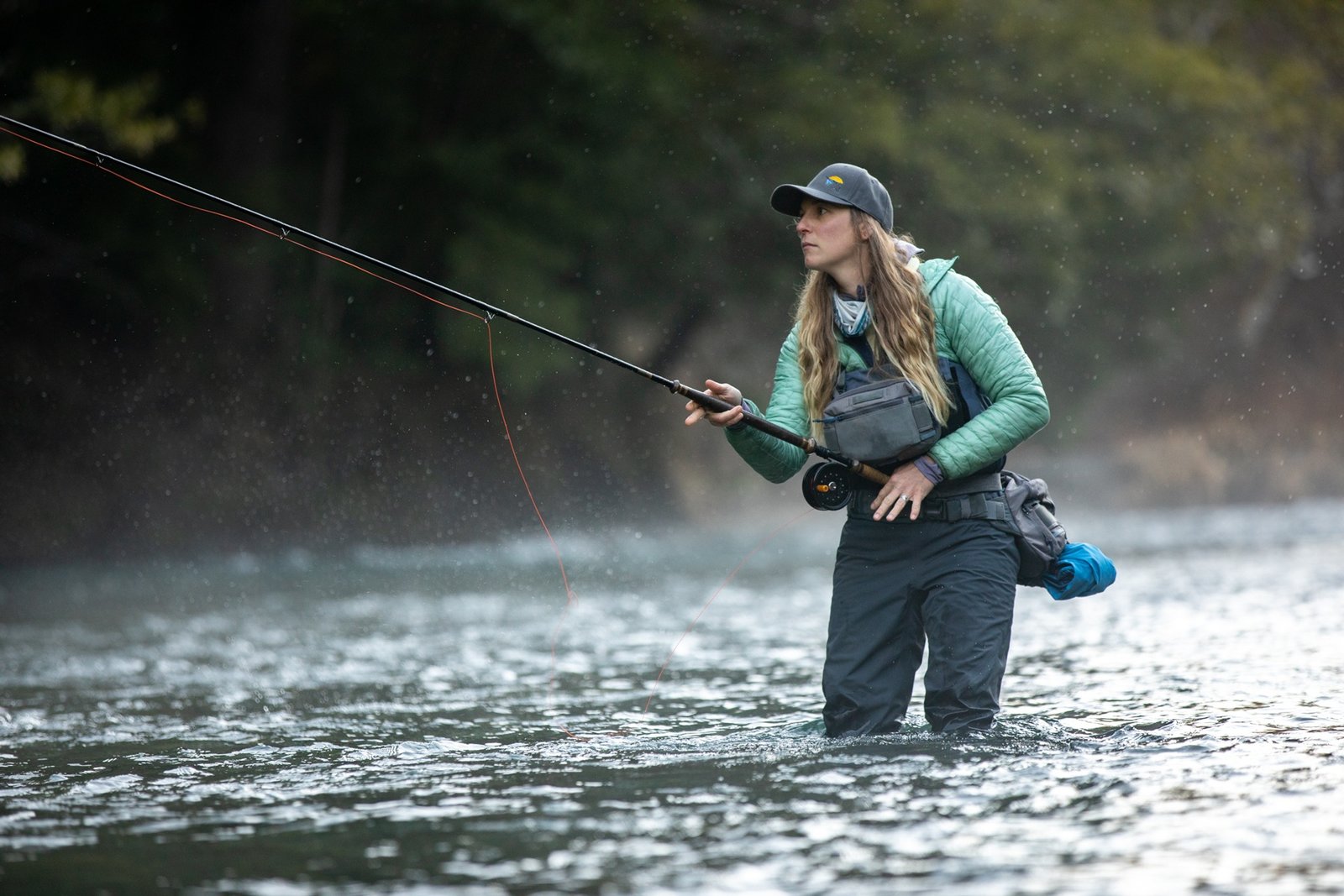 A guide at work during a trip, photographed by Humble Heron Fly Fishing in OR