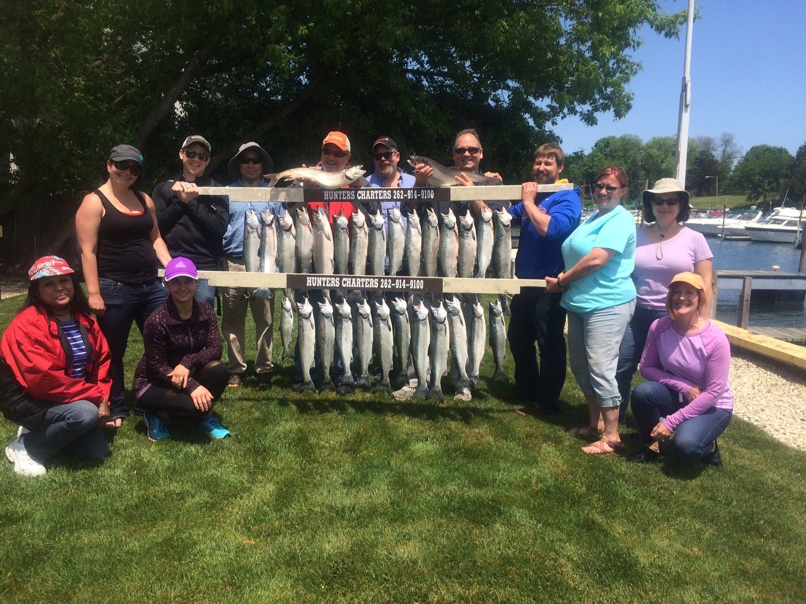 A guide working with a client on the water, photographed by Hunters Charters in WI