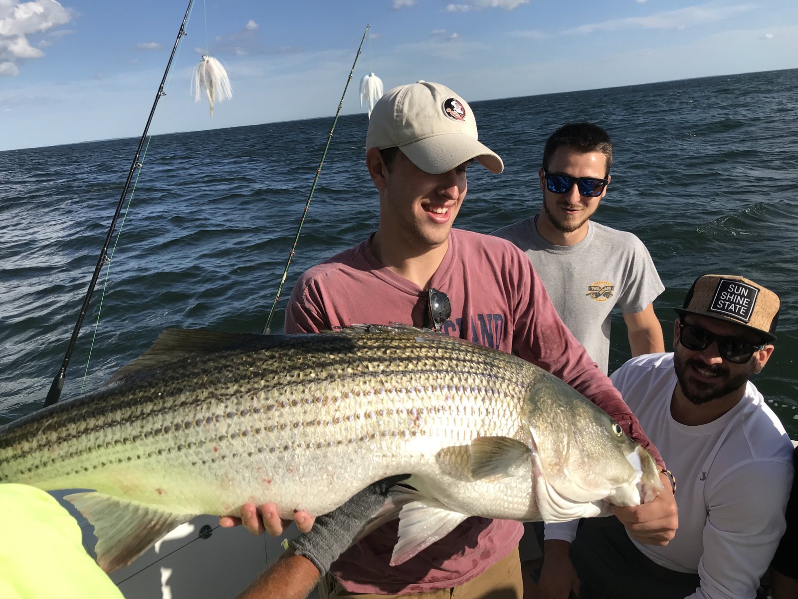 A guide at work during a trip, photographed by Islander Sport Fishing Charters in CT