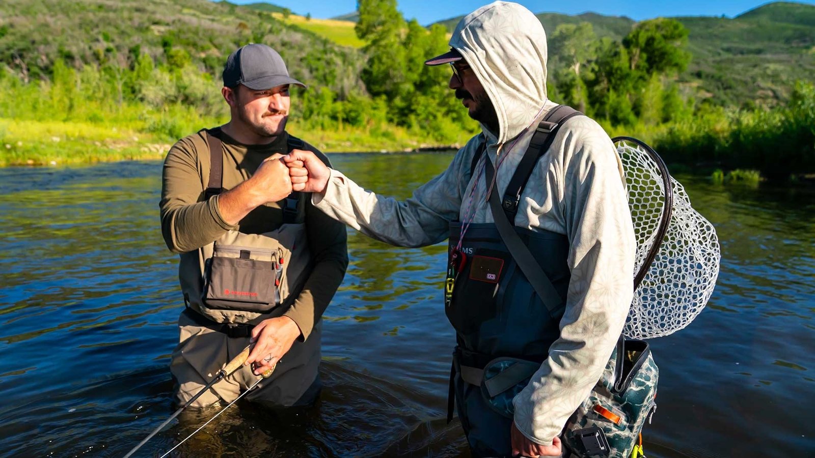 A guide working with a client on the water, photographed by Jans Mountain Outfitters in UT