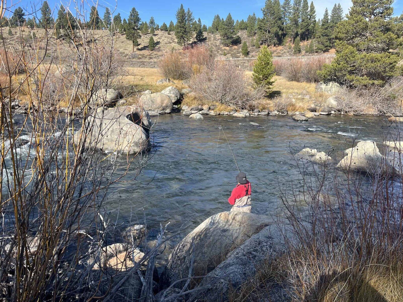 A guide at work during a trip, photographed by Jay Clark Fly Fishing in CA
