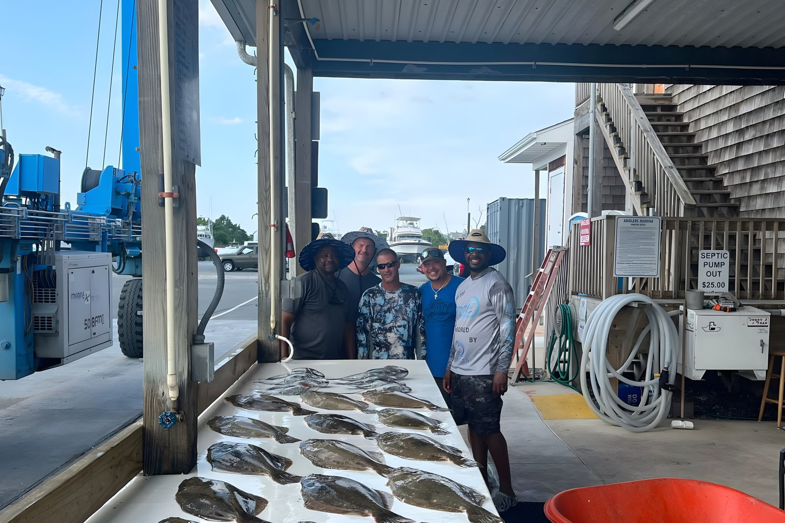 A guide working with a client on the water, photographed by JaySea II Sportfishing in DE
