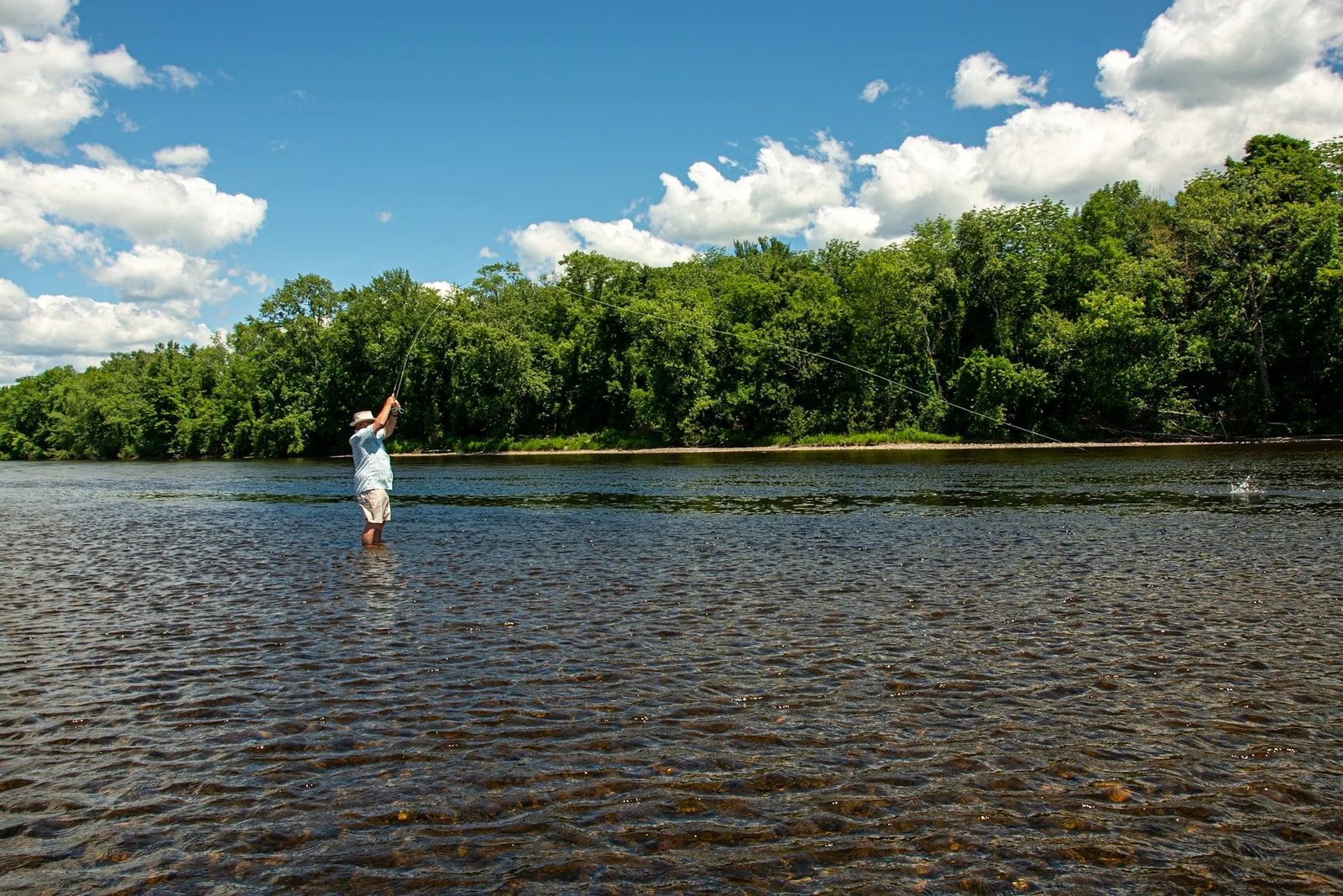 A working guide boat on open water, photographed by Kingfisher River Guides in ME