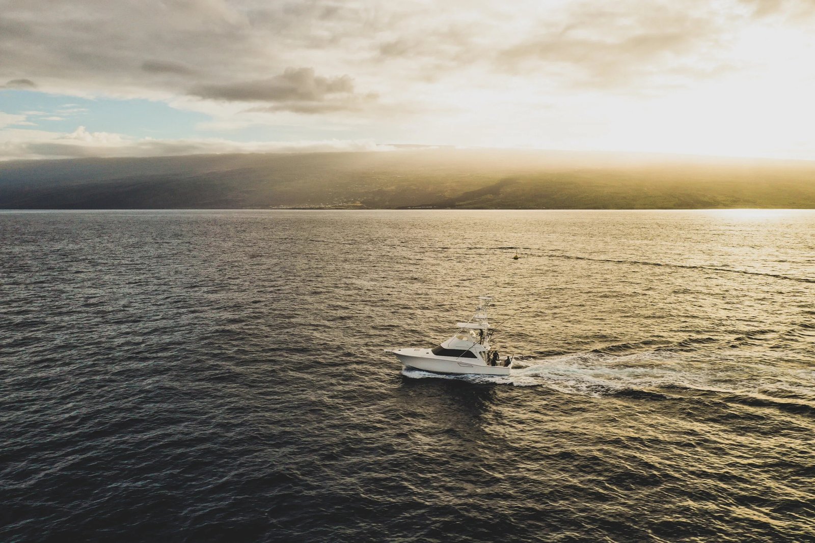 A guide working with a client on the water, photographed by Kona Sea Adventures in HI