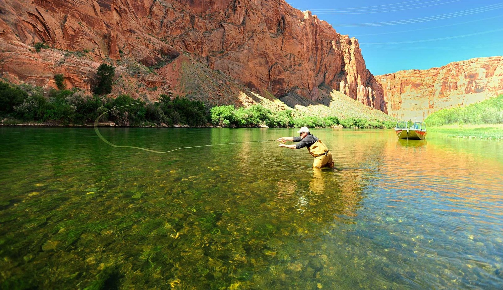 Emerald river water and canyon cliffs seen from above