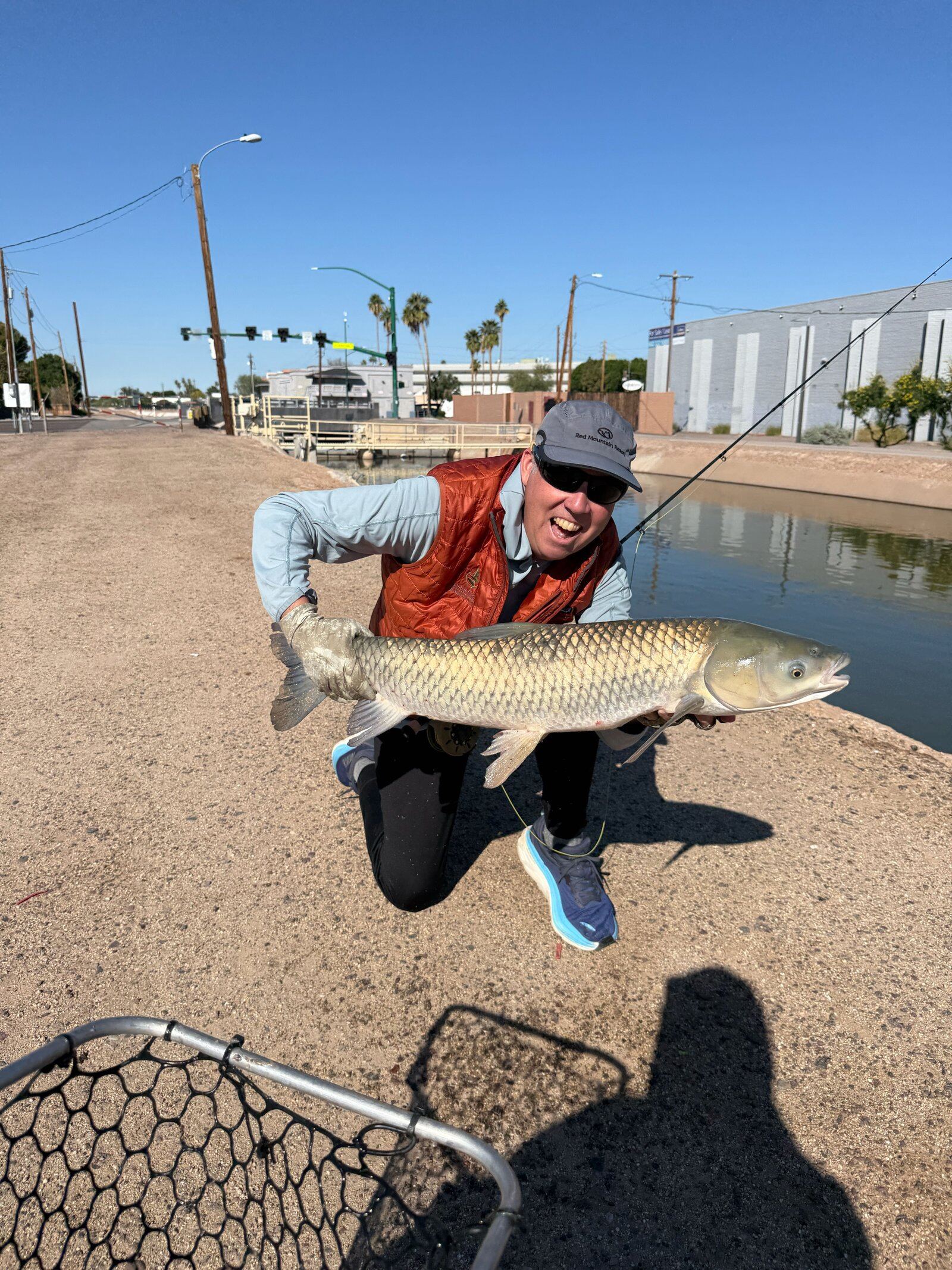 A guide working with a client on the water, photographed by Lo Water Guide Service in AZ