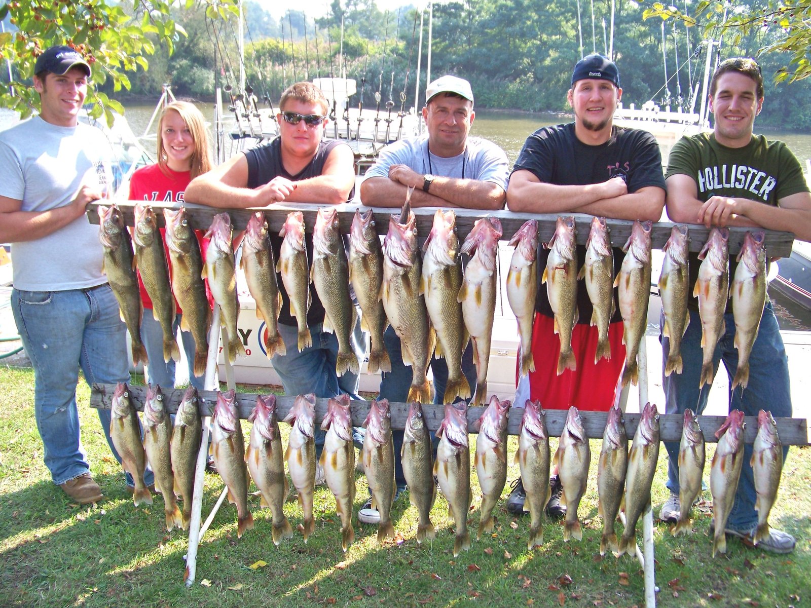 A guide working with a client on the water, photographed by Lucky Strike Sport Fishing in OH