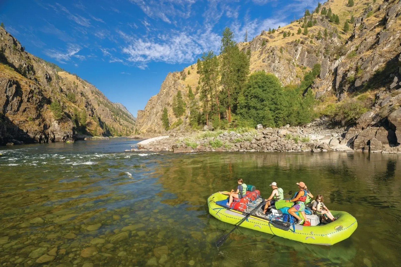 A guide at work during a trip, photographed by Mackay Wilderness River Trips in ID