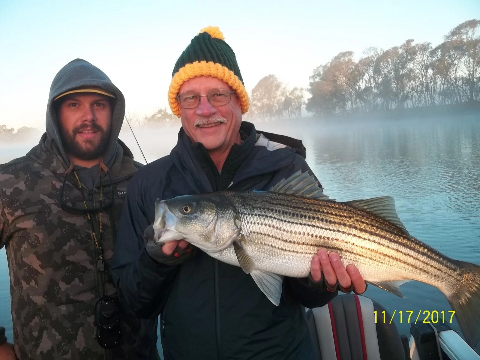 A guide working with a client on the water, photographed by MacKenzie On The Fly in CA