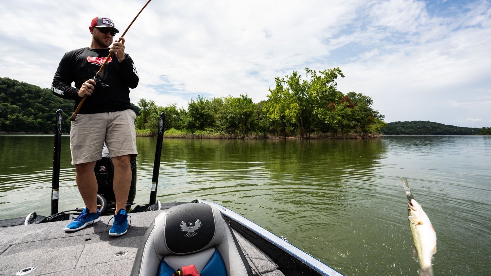 A guide working with a client on the water, photographed by MJF Guide Service in MO