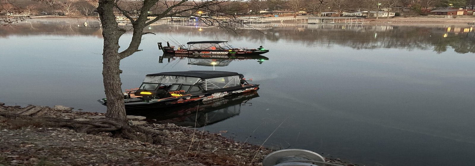 A guide working with a client on the water, photographed by No Wake Guide Service in OK