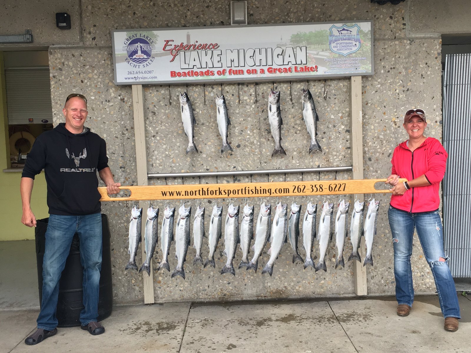 A guide working with a client on the water, photographed by North Fork Sportfishing in WI