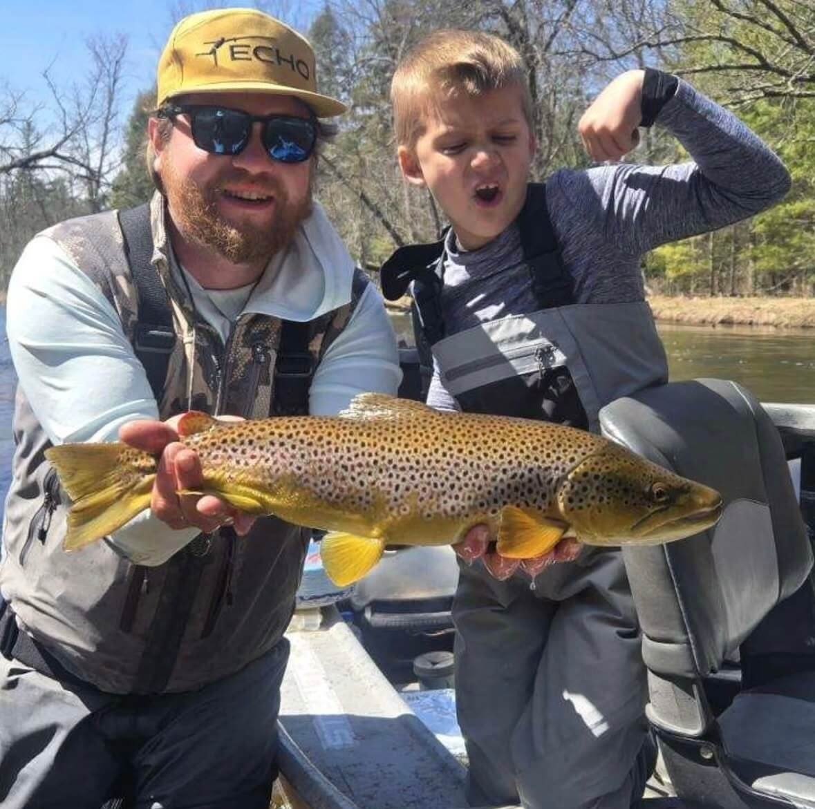 A guide at work during a trip, photographed by Northern Rivers Outfitters in MI