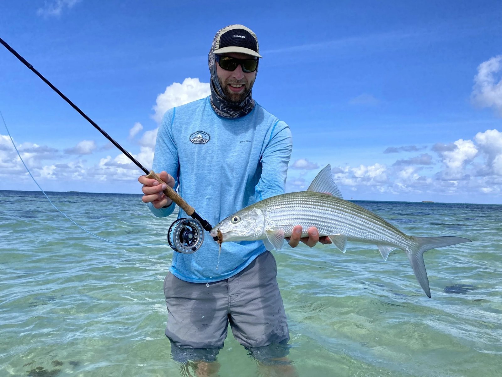 A guide at work during a trip, photographed by Oahu Fly Fishing in HI