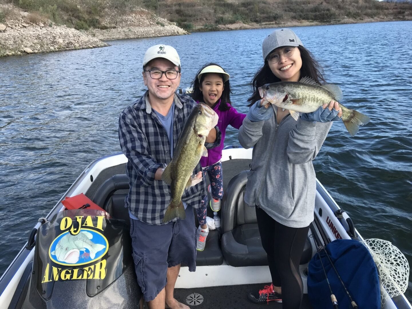 A guide working with a client on the water, photographed by Ojai Angler Fishing Guide Service in CA