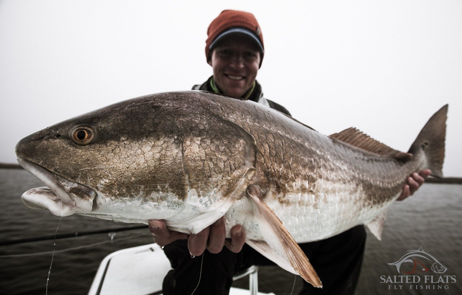 A guide at work during a trip, photographed by Panhandle Heritage Fly Fishing in FL