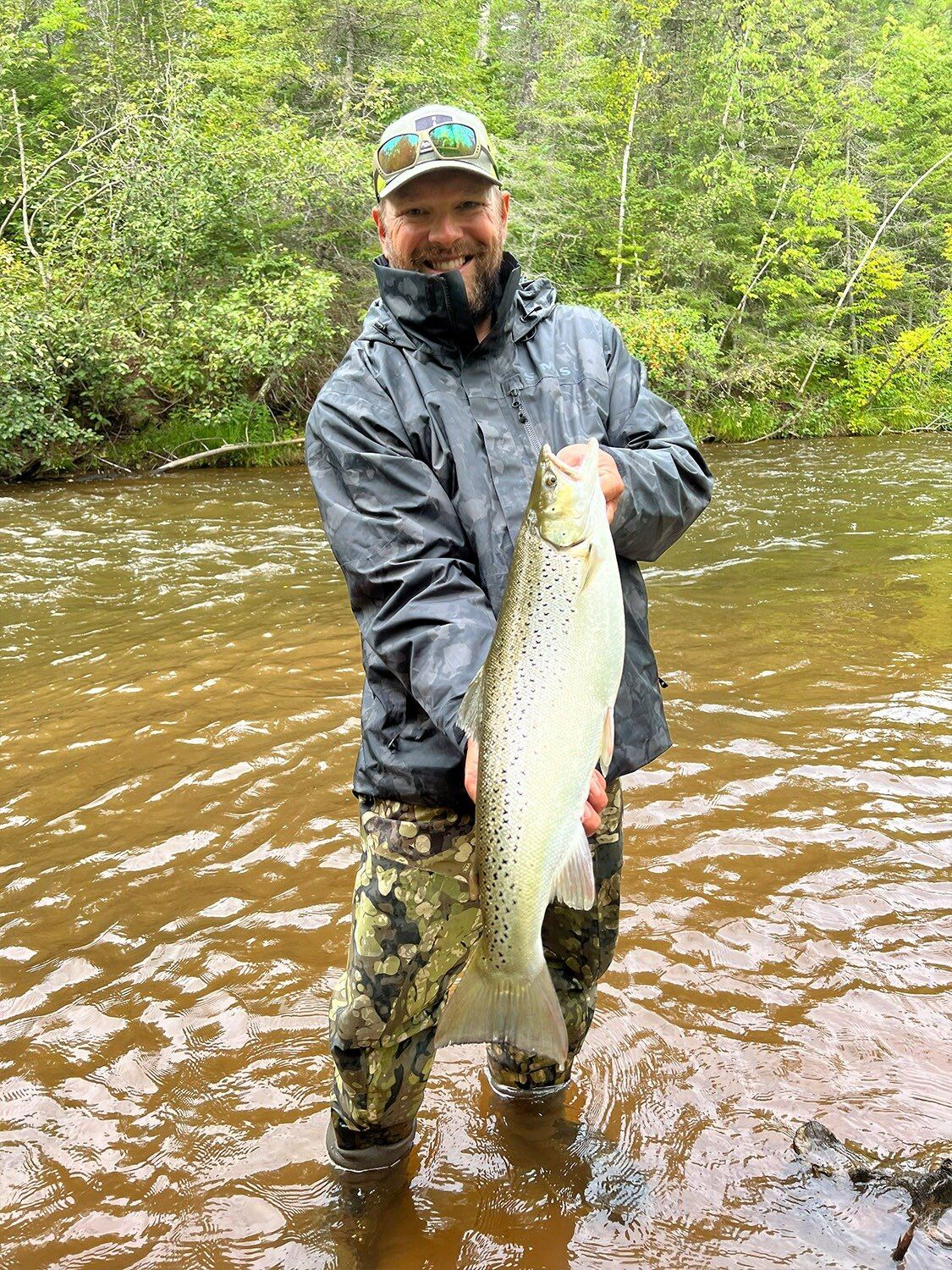 A guide at work during a trip, photographed by Paulsen's Quickstrike Charter Fishing in WI